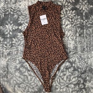 Forever 21 cheetah body suit with high neck. NWT.